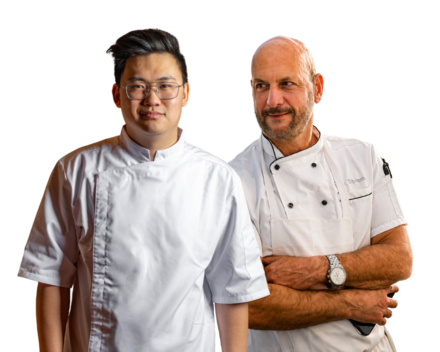Two chefs in professional uniforms at Chinese Restaurant Awards event.