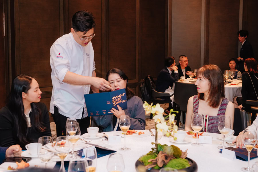 Chinese Restaurant Awards Ceremony Chef serving guests at Chinese Restaurant Awards event in Hong Kong.